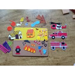 A FIRE FIGHTER FELT PIECES PLAYSCENE & PLAYBOARD, WITH OVER 20 PIECES