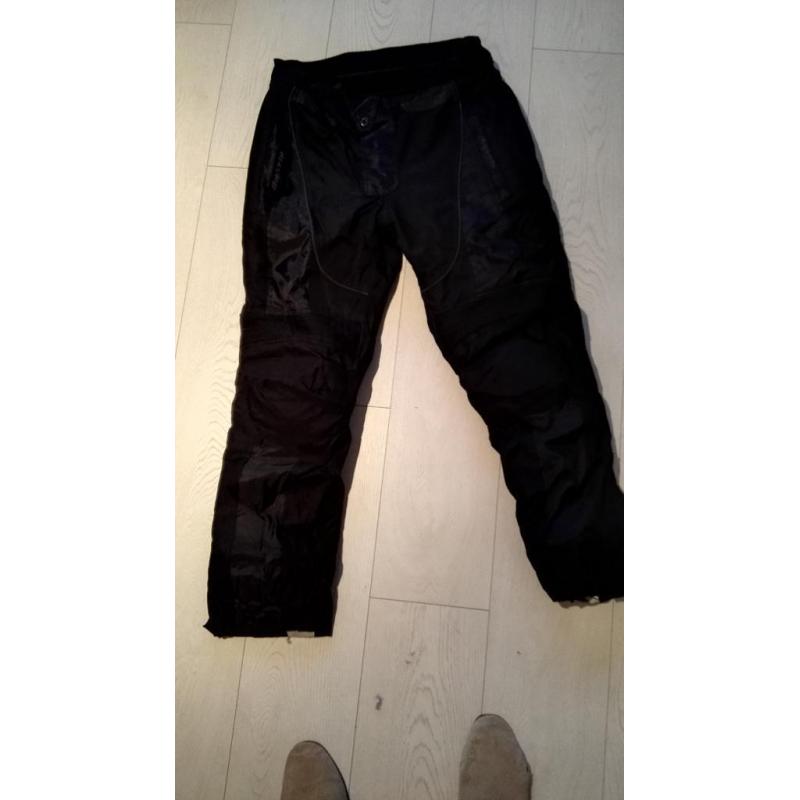 motorbike trousers waterproof with knee protectors, back. size L 52/32