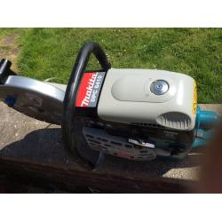 Makita 6410 petrol saw (used twice) plus four new diamond blades and one part Used fitted to saw