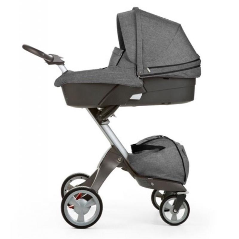 Stokke carry cot in black melange with raincover
