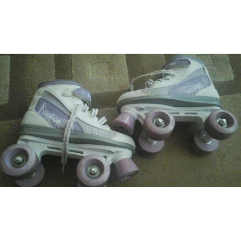 Girls purple and white roller boots