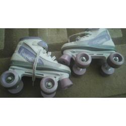 Girls purple and white roller boots