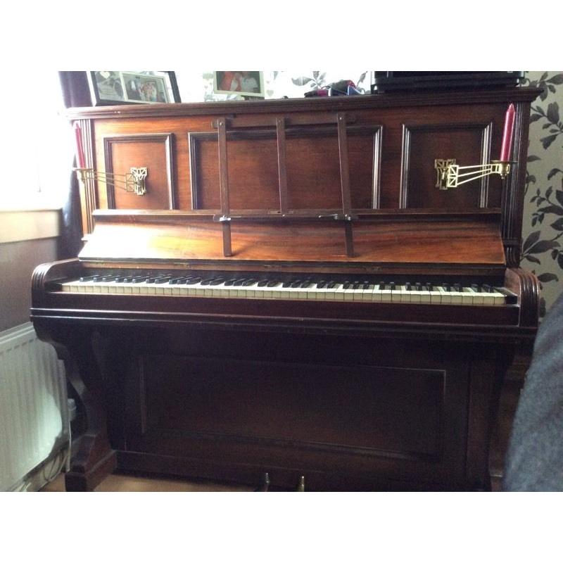 Dark oak upright piano