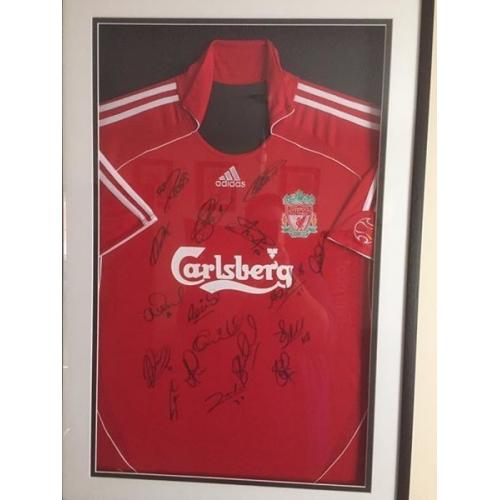 signed liverpool football shirt in frame