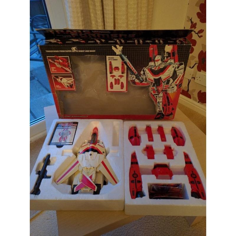 Collection of vintage Hasbro Transformers G1 with original boxes