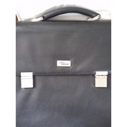 Black leather lap top case with laptop bag insert.