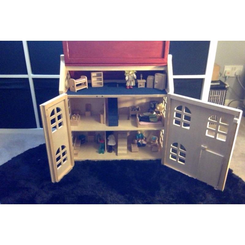 Wooden Doll House - Rarely Been Used.