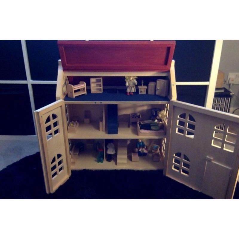 Wooden Doll House - Rarely Been Used.