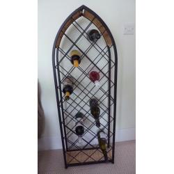 Attractive free-standing, arch-shaped wine rack for up to 38 bottles