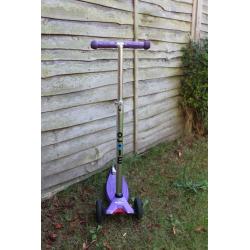 Purple micro scooter
