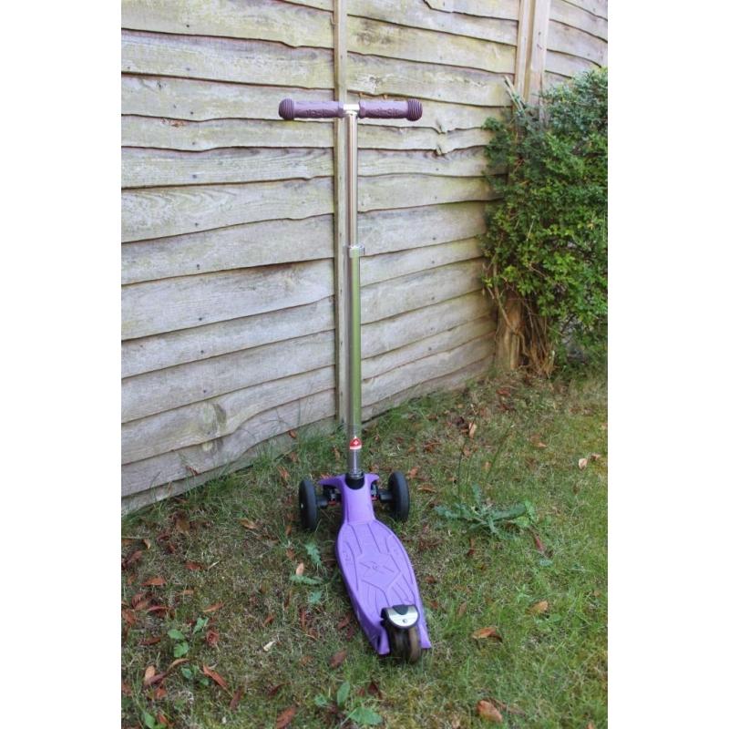 Purple micro scooter
