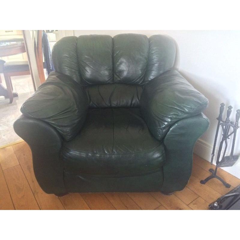Green leather 3 1 1 with foot stool.