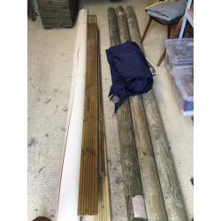 3 x Wooden poles plus navy blue garden shade sail