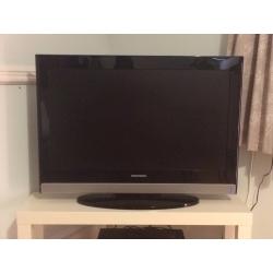 32'' Grundig LCD TV for sale with stand and remote