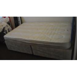 Small double bed with mattress and headboard