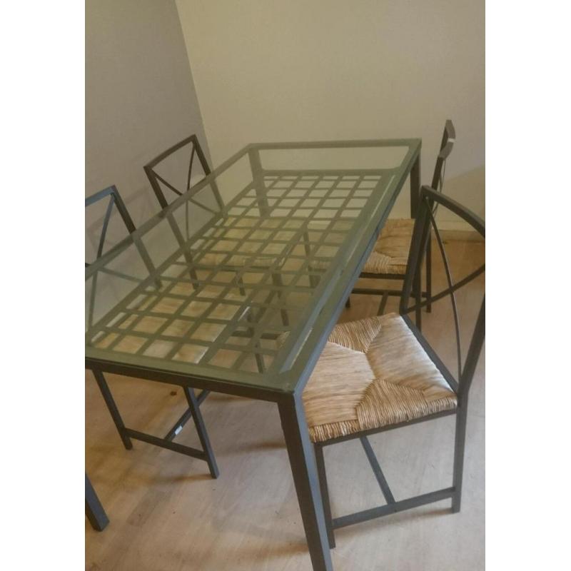 Glass top dining table and 4 chairs