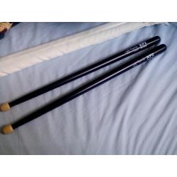 Drum sticks and practice pad