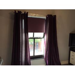 Large sheen effect fully lined purple curtains