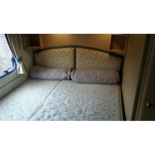 Small abbey vogue fixed bed caravan