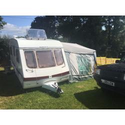 Swift Charisma 550 4 Berth Fixed Bed With Full Awning Plus Weekend Awning