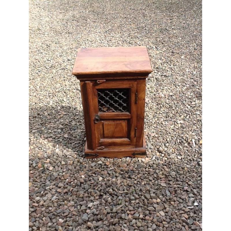 Small Wooden cabinet with metal grill on door