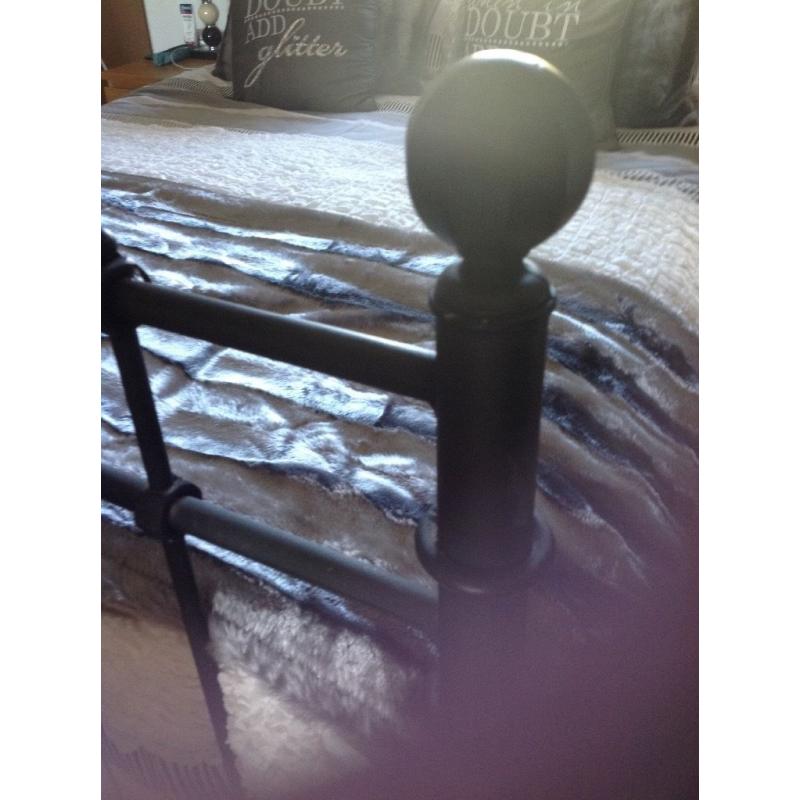 King size iron bed frame ..... Black iron bed frame in excellent condition with or without mattress
