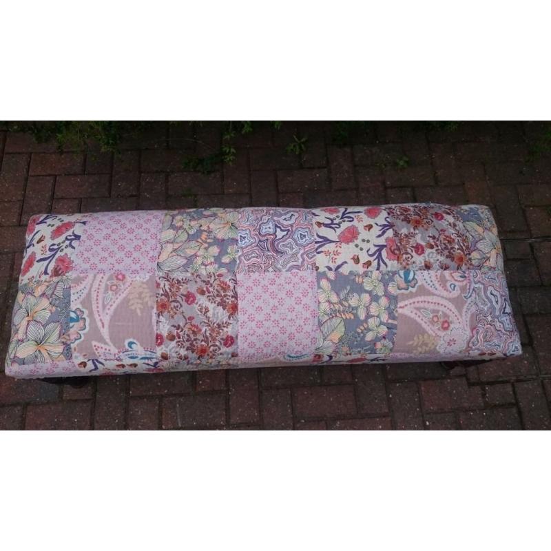 Large footstool with vintage fabric
