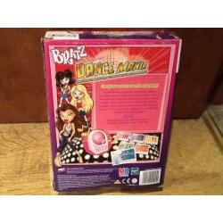 A BRATZ DANCE MANIA GAME - AN ELECTRONIC GAME TO GET YOU GROOVIN, 72 DIFFERENT DANCE MOVES AGE 7+