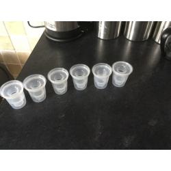 Tommee tippee milk pots never been used.