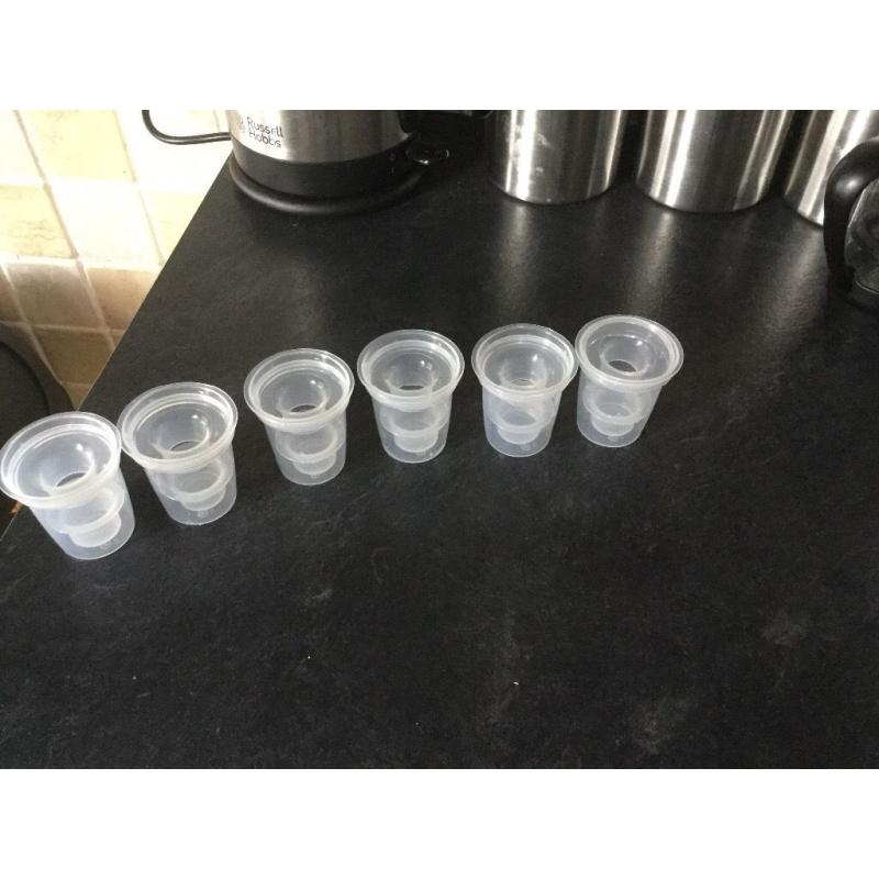 Tommee tippee milk pots never been used.