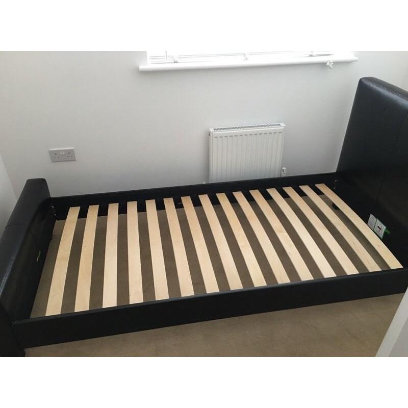 Black single faux leather bed