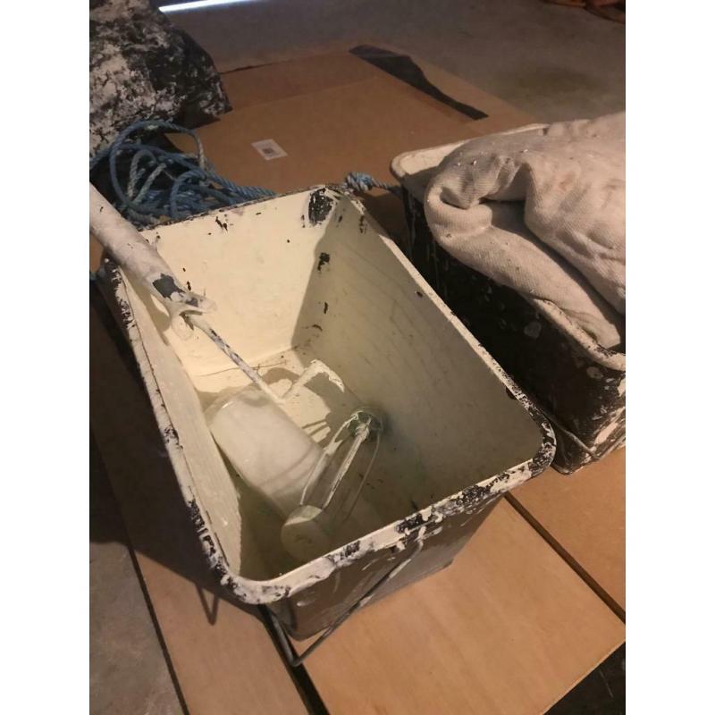 Painters buckets and dust sheet