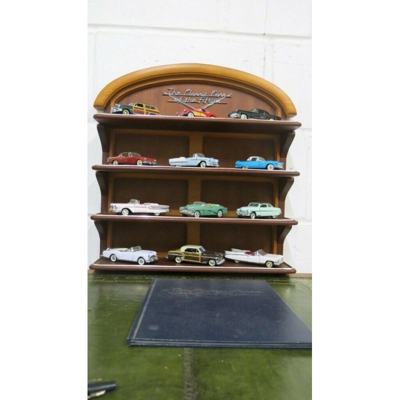 12 Classic Cars of the Fifties collection by Franklin Mint. Display rack. ?95