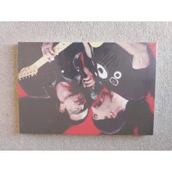 U2 book and canvases