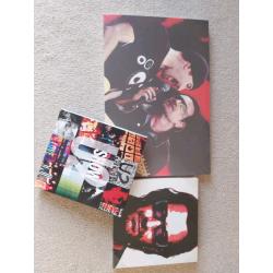 U2 book and canvases