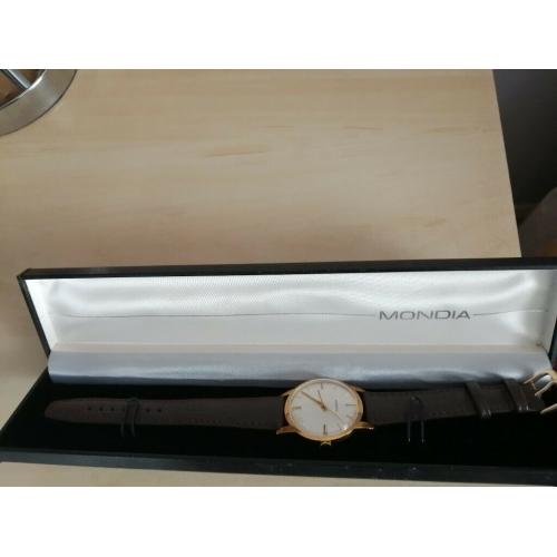 Mens Mondia Watch.( Solid Gold). OFFERS IN PERSON ONLY CONSIDERED