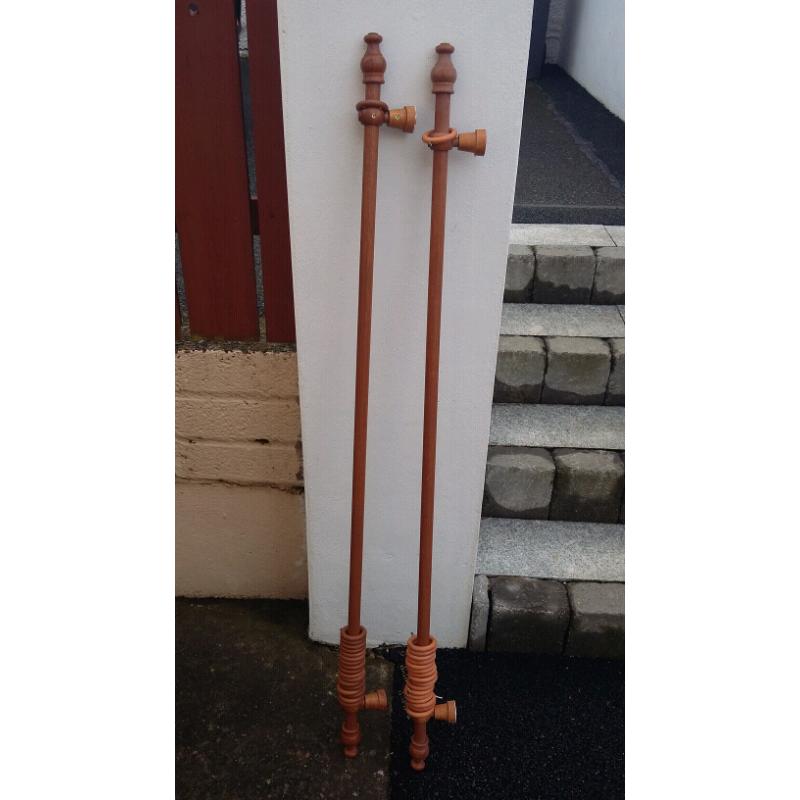 2 wooden curtain poles