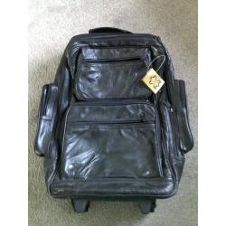Brand new tagged leather suitcase