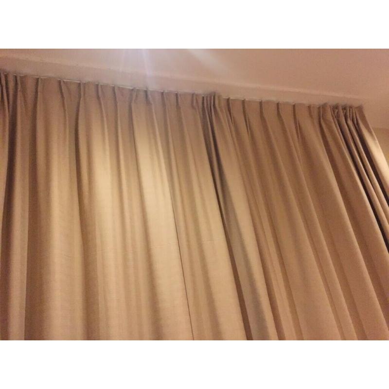 Automated curtain track and custom blackout curtains