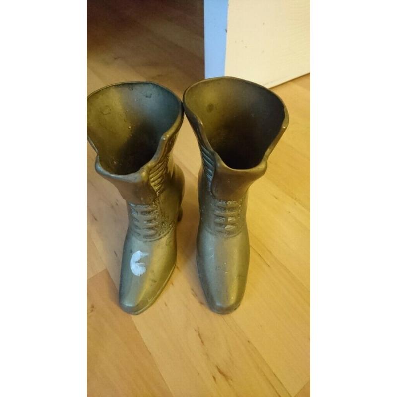 pair of antique brass boots