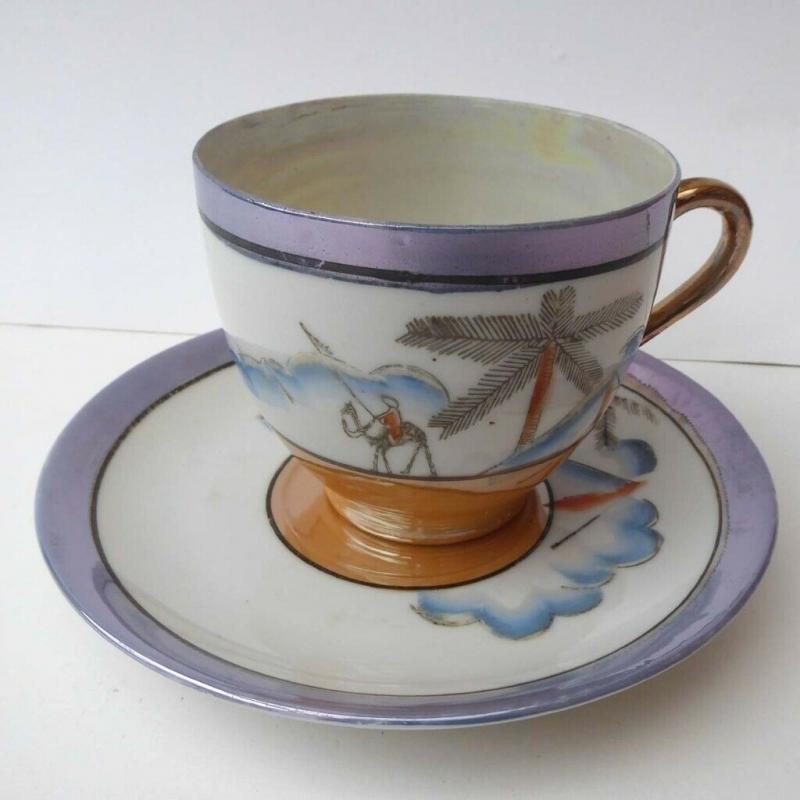 Japanese eggshell porcelain cup and saucer. Antique lustre ware. Vintage Meadin.